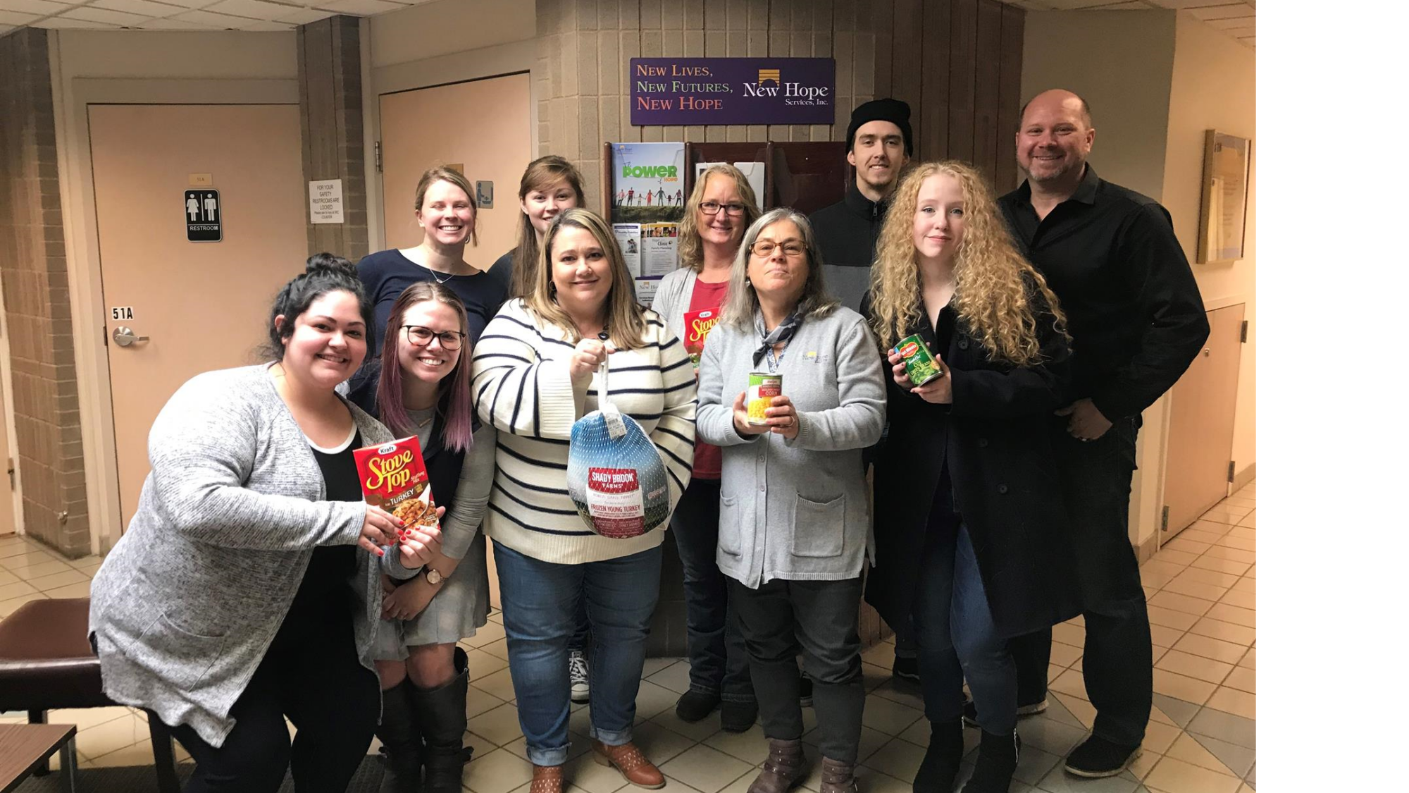 Group of staff at New Hope services food drive